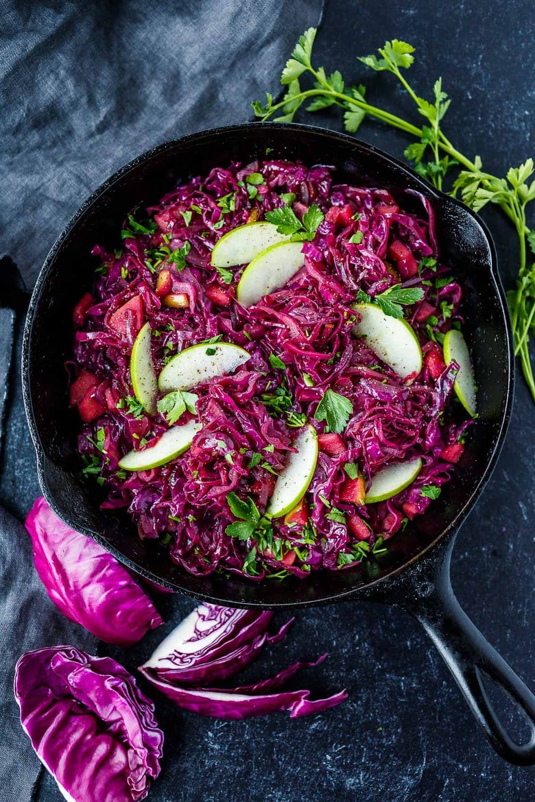 Warm Red Cabbage Slaw with tart apples is a delicious winter side dish with a lovely sweet and sour balance.  A  healthy complement to rich holiday dishes.  Simple to make.  Vegan and gluten-free.