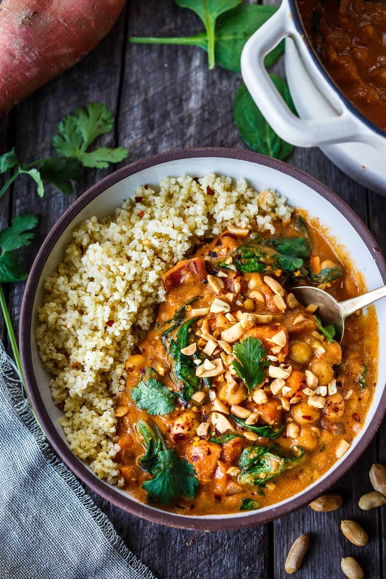 Spicy African Peanut Soup is made with everyday pantry items that transform into a lively soup with full bodied flavors. Richly spiced with ginger, garlic, and chilies in a creamy peanut tomato base, this protein-rich soup is one you will crave.  Vegan and Gluten-free!