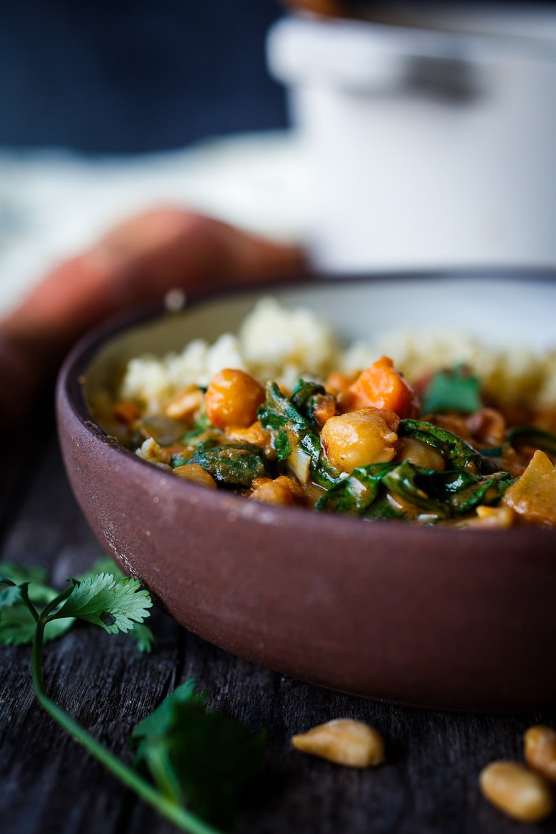 Spicy African Peanut Soup is made with everyday pantry items that transform into a lively soup with full bodied flavors. Richly spiced with ginger, garlic, and chilies in a creamy peanut tomato base, this protein-rich soup is one you will crave.  Vegan and Gluten-free!