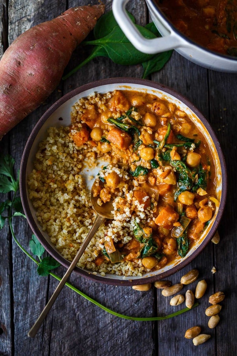 Spicy African Peanut Soup is made with everyday pantry items that transform into a lively soup with full bodied flavors. Richly spiced with ginger, garlic, and chilies in a creamy peanut tomato base, this protein-rich soup is one you will crave.  Vegan and Gluten-free!