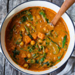 Spicy African Peanut Soup is made with everyday pantry items that transform into a lively soup with full bodied flavors. Richly spiced with ginger, garlic, and chilies in a creamy peanut tomato base, this protein-rich soup is one you will crave. Vegan and Gluten-free!