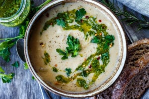 Creamy White Bean Soup with Leeks and Rosemary drizzled with flavorful herby Gremolata- a quick and easy vegan meal. Healthy & delicious!