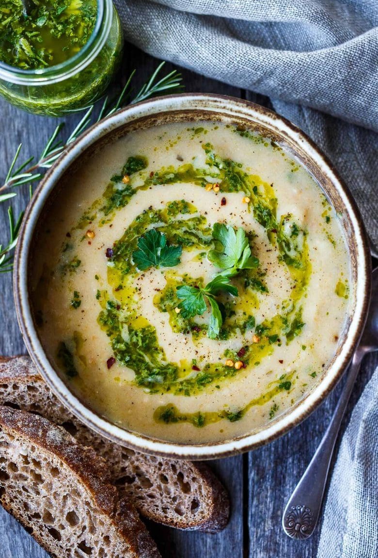 Creamy White Bean Soup with Leeks and Rosemary drizzled with flavorful herby Gremolata- a quick and easy vegan meal. Healthy & delicious!