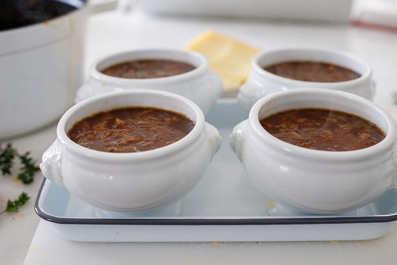 ladle soup into oven proof bowls or ramekins