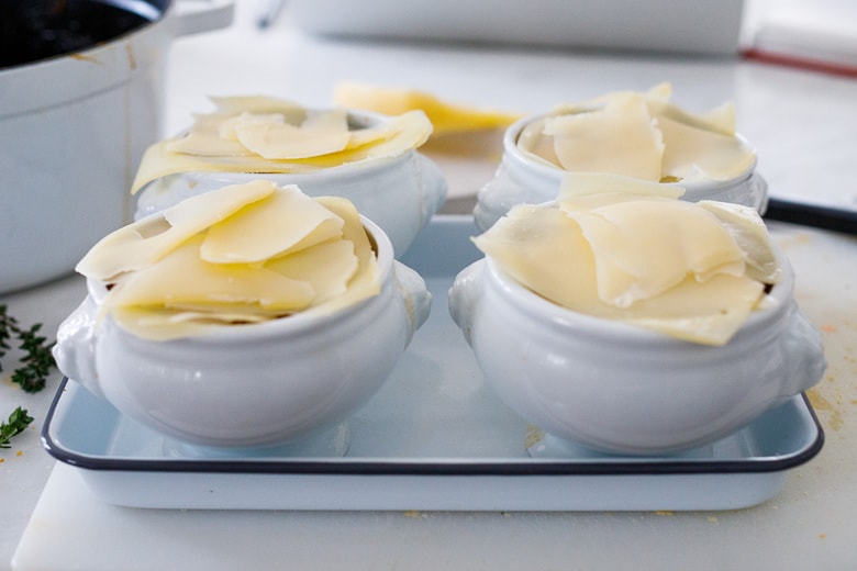 place ramekins over a sheet pan to catch any drippings