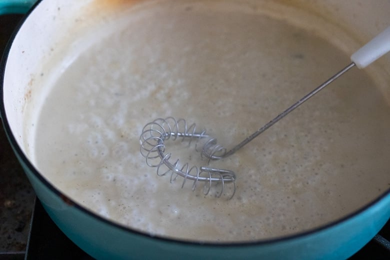 whisking the Gorgonzola sauce