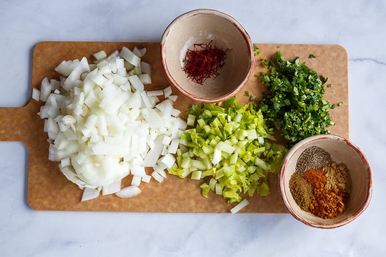 Chopped onion, celery and herbs for Harira.