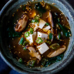 20-minute Miso Soup Recipe with shiitake mushrooms, wilted greens, and tofu makes for a fast and easy weeknight dinner. Full of flavor and nutrients it is highly nourishing while remaining light and lean. Vegan and GF adaptable.