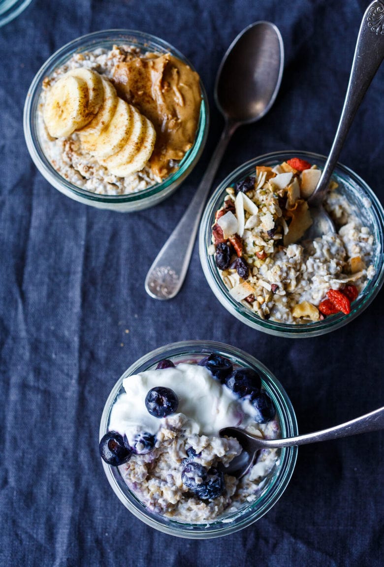 Creamy Overnight Oats, an easy no-cook technique for a healthy grab-and-go breakfast or snack that is full of fiber and completely adaptable.  Top with fruit, nuts, seeds, peanut butter and yogurt.