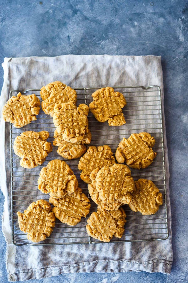 Quick to make with pantry ingredients, these easy one bowl Vegan Peanut Butter Cookies are chewy, delicious and packed with peanut butter goodness.