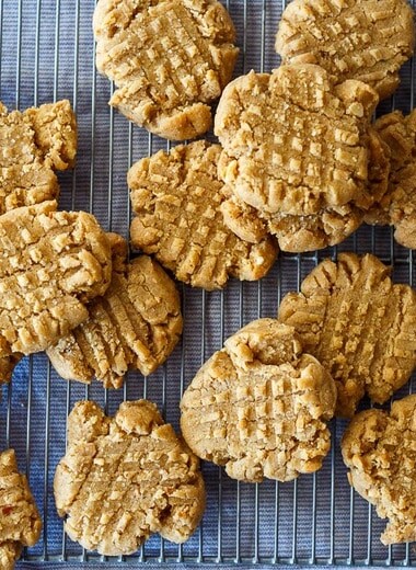 Quick to make with pantry ingredients, these easy one bowl Vegan Peanut Butter Cookies are chewy, delicious and packed with peanut butter goodness.