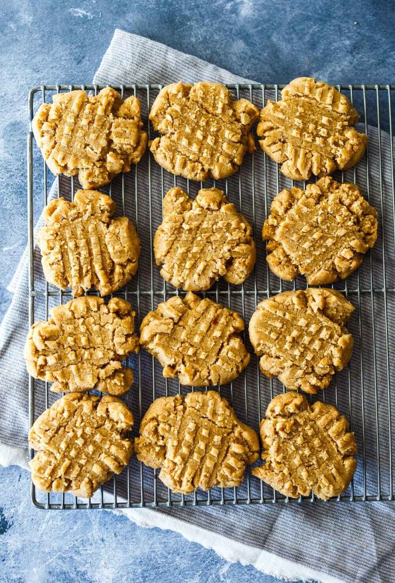Quick to make with pantry ingredients, these easy one bowl Vegan Peanut Butter Cookies are chewy, delicious and packed with peanut butter goodness.