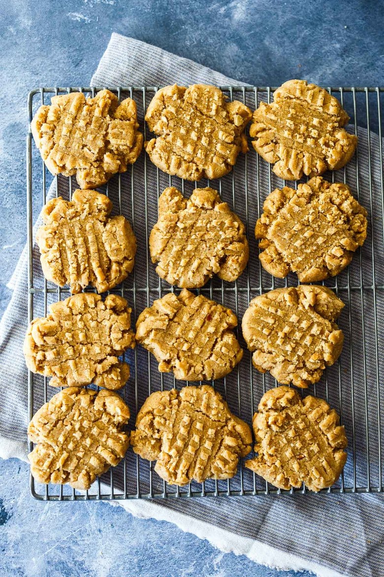 Quick to make with pantry ingredients, these easy one bowl Vegan Peanut Butter Cookies are chewy, delicious and packed with peanut butter goodness.