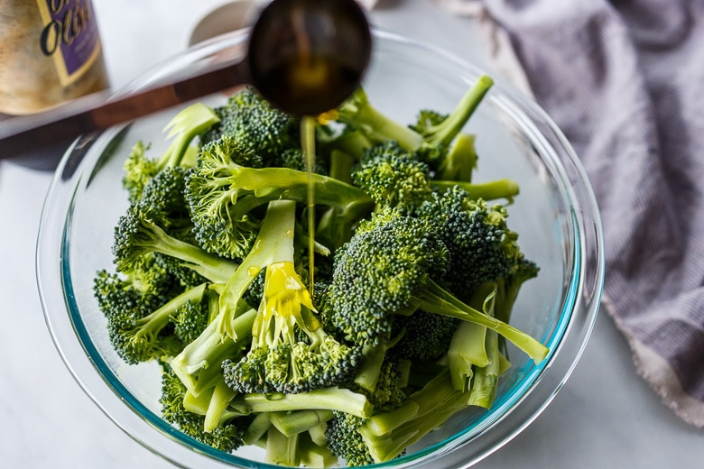 toss the broccoli florets with olive oil and salt