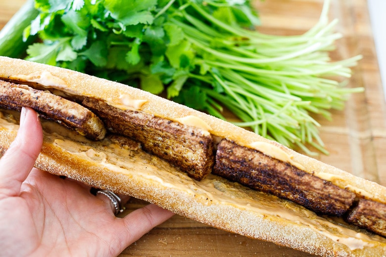 filling the banh mi sandwich