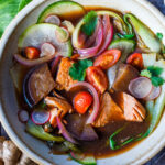 Sinigang! Filipino Sour Soup with Salmon is bursting with umami flavor.  Quick to throw together, loaded with veggies and completely delicious.  Serve with rice if desired.  Vegan-adaptable and gluten free.