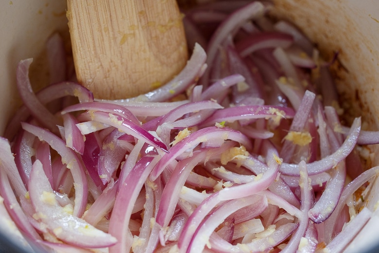 Sautéing onion and ginger.