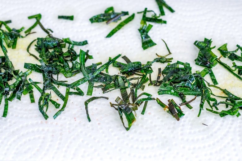 frizzled leeks on a paper towel