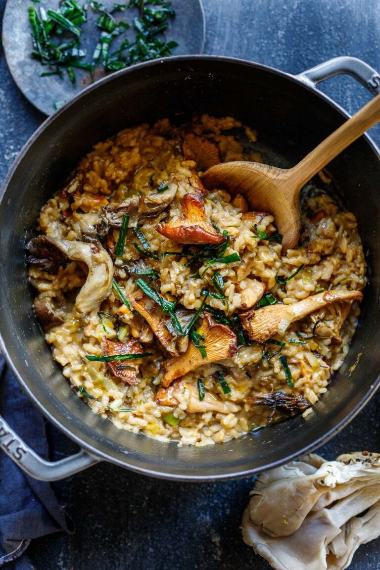 Simple authentic Mushroom Risotto with rosemary, garlic and frizzled leeks- a satisfying, elegant vegetarian dinner, perfect for special occasions, date night or entertaining. 