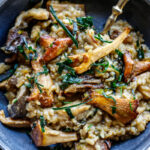 Simple authentic Mushroom Risotto with rosemary, garlic and frizzled leeks- a satisfying, elegant vegetarian dinner, perfect for special occasions, date night or entertaining. 