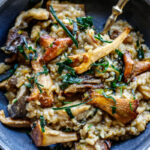 Simple authentic Mushroom Risotto with rosemary, garlic and frizzled leeks- a satisfying, elegant vegetarian dinner, perfect for special occasions, date night or entertaining.