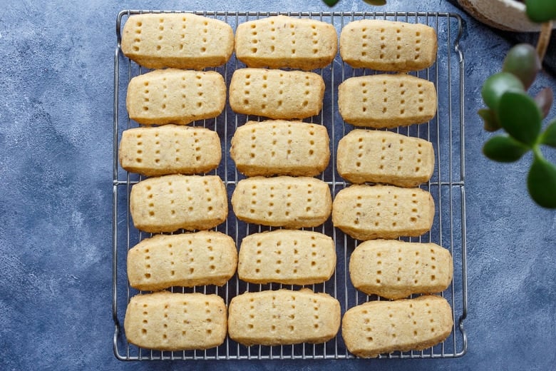 baked shortbread cookies on cooling rack.