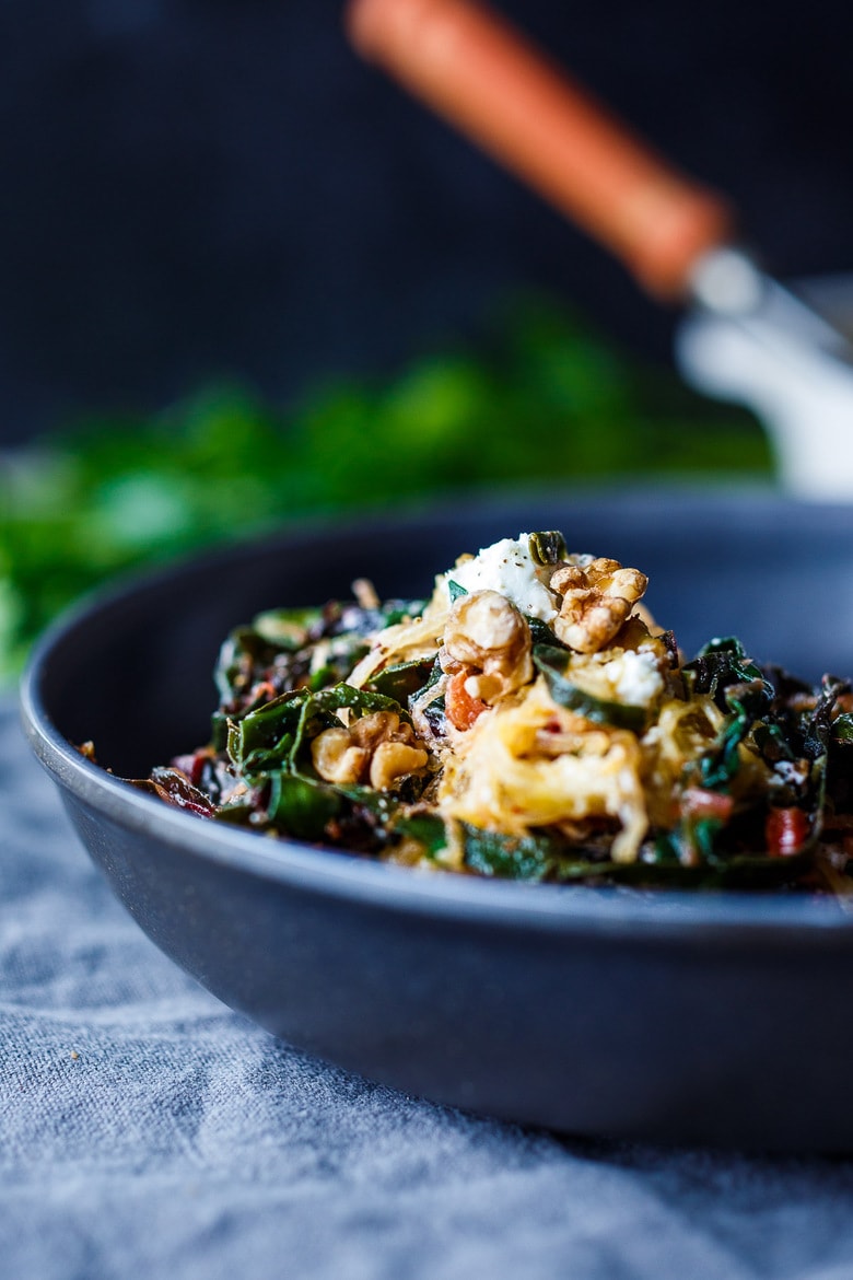 A simple tasty recipe for Roasted Spaghetti Squash with Chard, Toasted Walnuts and Chèvre.  A healthy low-carb meal perfect for serving with your favorite protein. 