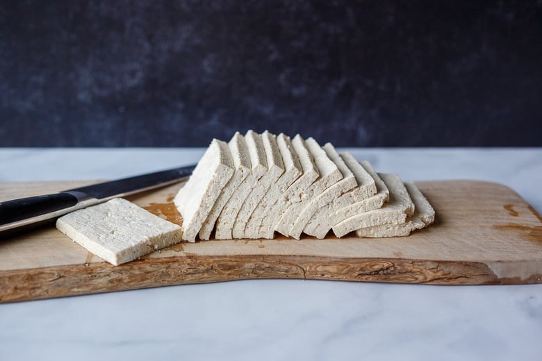 Slicing tofu for tofu bacon