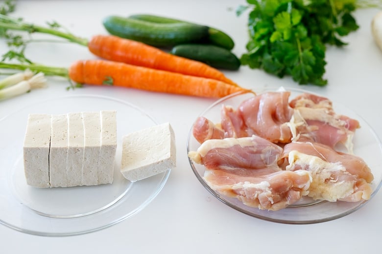 tofu and chicken being prepped for banh mi