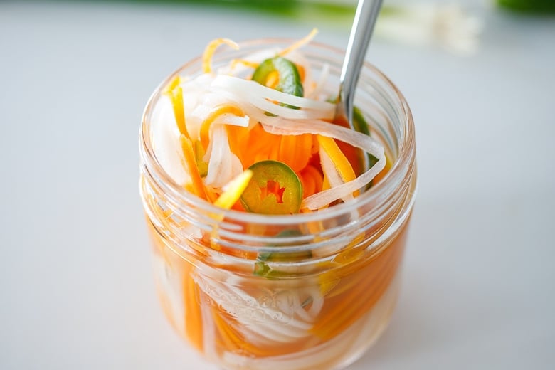 pickled daikon and carrots in a jar for banh mi sandwich
