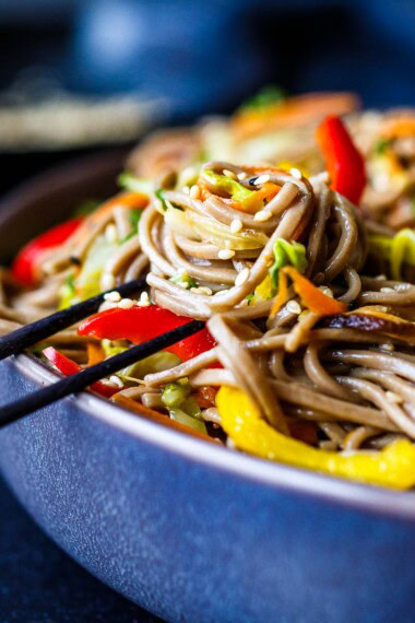 soba noodles in a bowl with chopsticks.