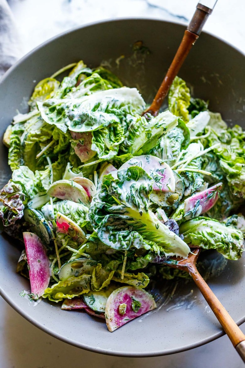 Little Gem Salad with avocado, radishes, cucumber, pickled onions, pepitas, sunflower sprouts, in a Homemade Dilly Ranch Dressing. 