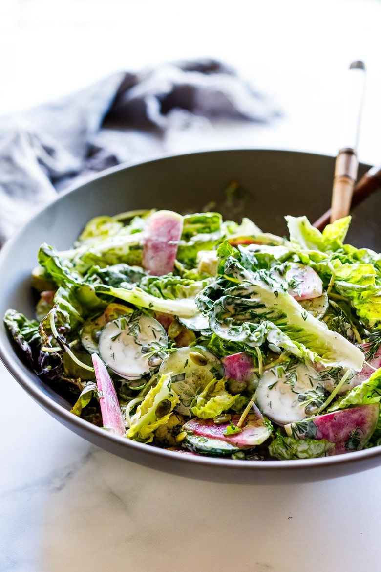 Little Gem Salad with avocado, radishes, cucumber, pickled onions, pepitas, sunflower sprouts, in a Homemade Dilly Ranch Dressing. 