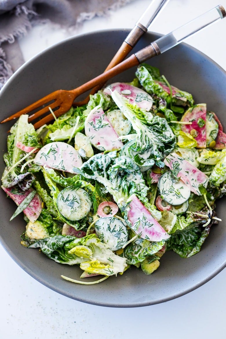 Little Gem Salad with avocado, radishes, cucumber, pickled onions, pepitas, sunflower sprouts, in a Homemade Dilly Ranch Dressing. 