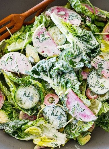 Little Gem Salad with avocado, radishes, cucumber, pickled onions, pepitas, sunflower sprouts, in a Homemade Dilly Ranch Dressing.