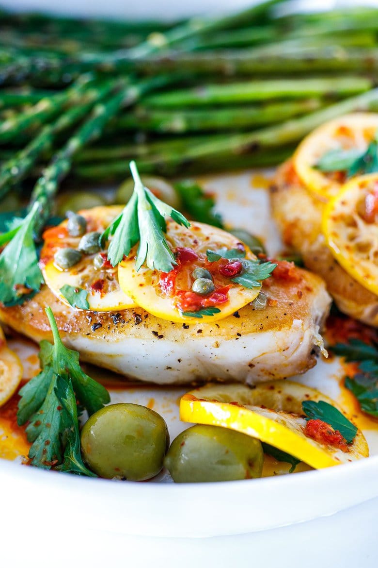 Here's a tasty recipe for Pan-Seared Halibut topped with olive oil marinated Meyer lemons, buttery Castlevetrano olives, capers and Calabrian chilies. Once the lemons are marinated the dish comes together in 15 minutes!