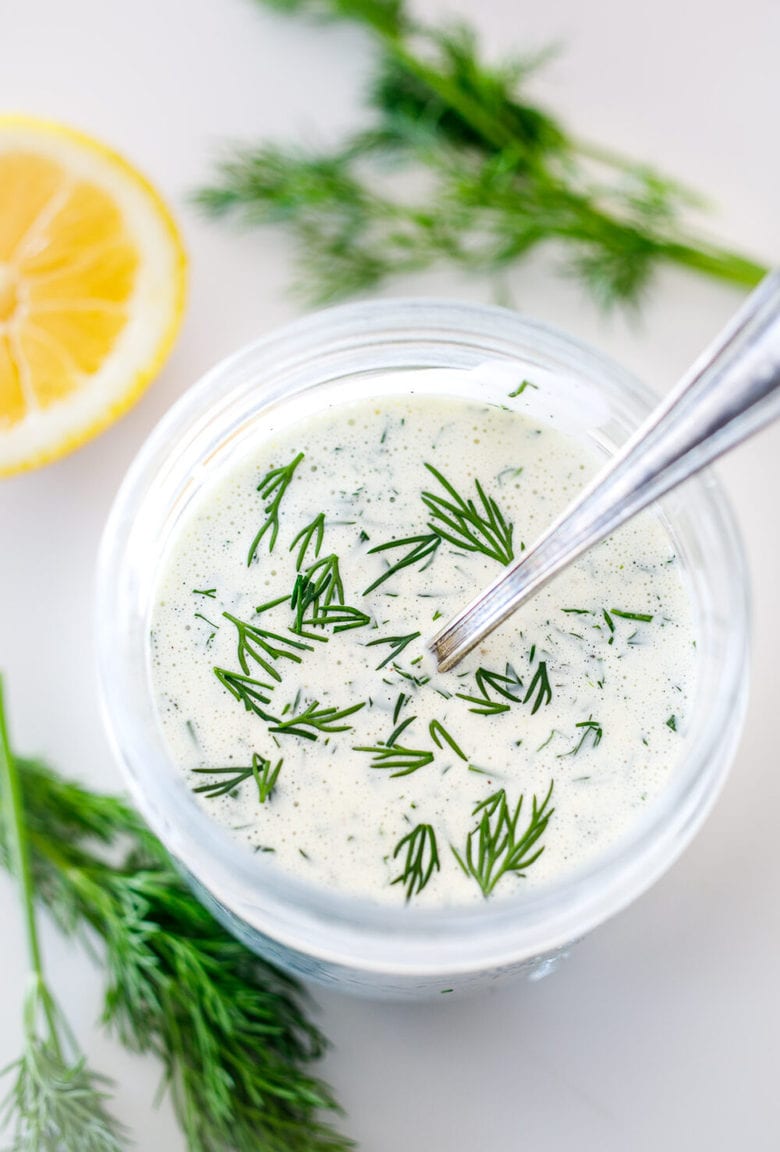 How to make the creamiest Ranch Dressing from scratch loaded up with fresh dill- this easy recipe is creamy, tangy, peppery, and full of flavor! 