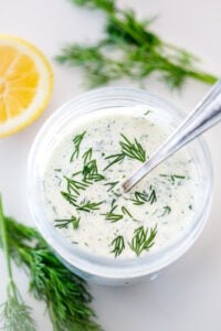 How to make the creamiest Ranch Dressing from scratch loaded up with fresh dill- this easy recipe is creamy, tangy, peppery, and full of flavor! 