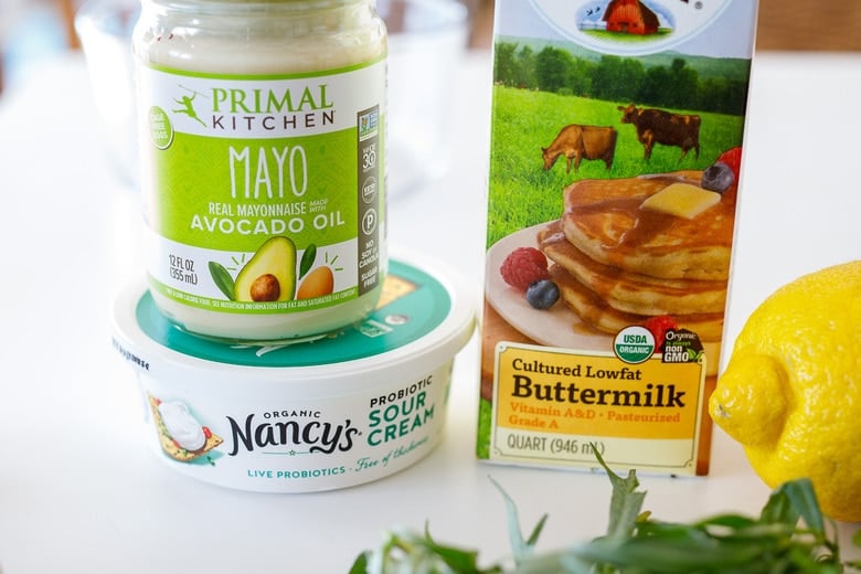 ranch dressing ingredients- sour cream, buttermilk and mayo, lemon and herbs.