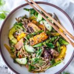 A simple recipe for Soba Noodle Salad, loaded with veggies, that is adaptable and vegan! For a protein boost, top with savory baked tofu, smoked salmon, grilled chicken.