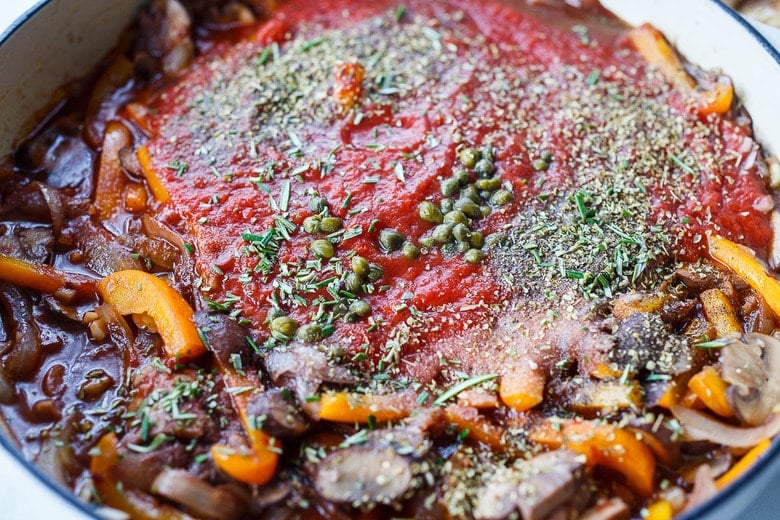 add tomatoes, wine, herbs, olives, capers