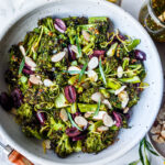 Easy Roasted Broccoli Salad with toasted almonds, kalamata olives, and lemon zest drizzled with Mustard Seed Maple Dressing.