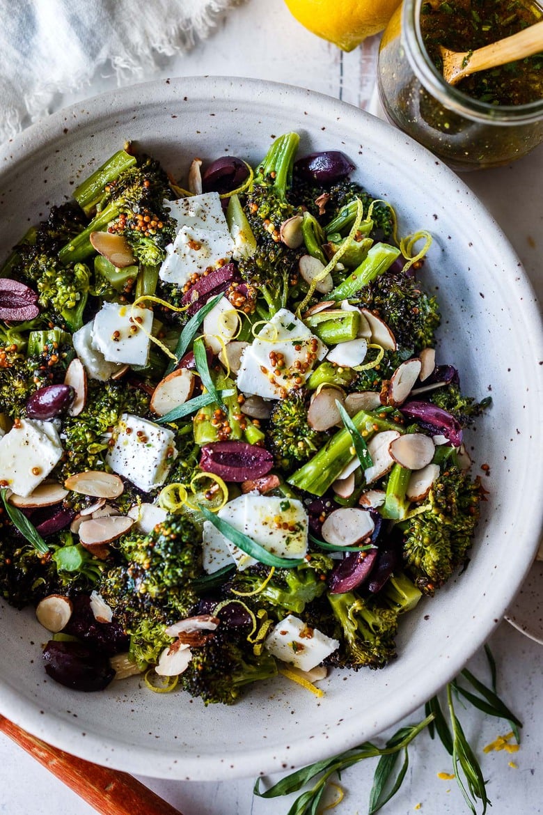 Easy Roasted Broccoli Salad with toasted almonds, kalamata olives, and lemon zest, drizzled with delicious Mustard Seed Maple Dressing.  Amazingly simple, yet filled with so much vibrant flavor. 