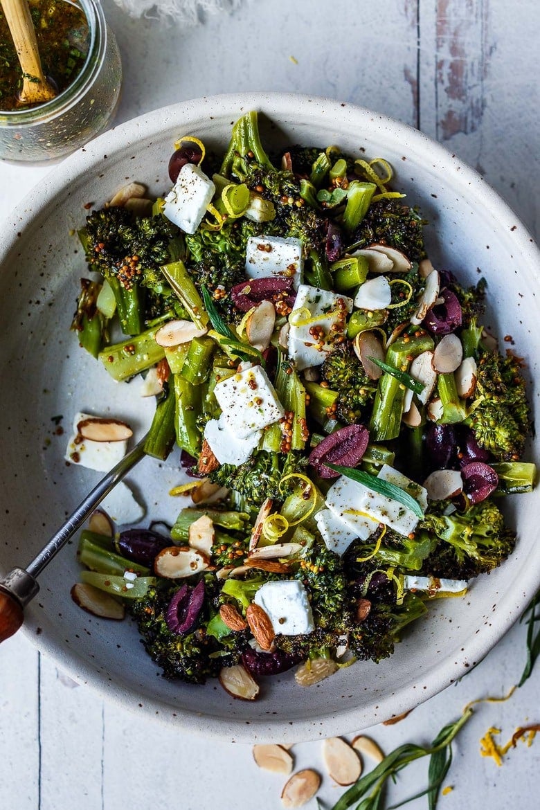 Easy Roasted Broccoli Salad with toasted almonds, kalamata olives, and lemon zest, drizzled with delicious Mustard Seed Maple Dressing.  Amazingly simple, yet filled with so much vibrant flavor. 