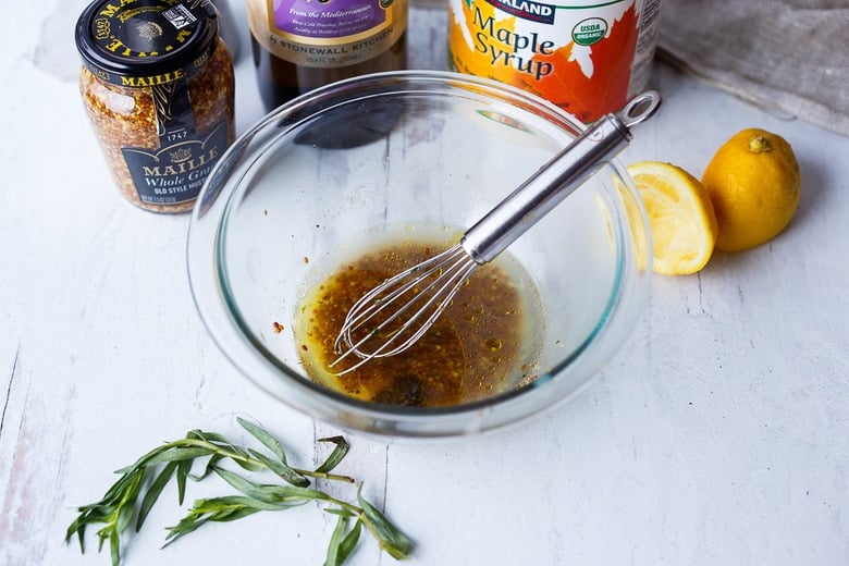 whisking the dressing together