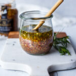 Bright and tangy, this Mustard Seed Maple Dressing with tarragon and shallots is the perfect complement to roasted or grilled veggies and hearty salads. Easy, quick, and Vegan!