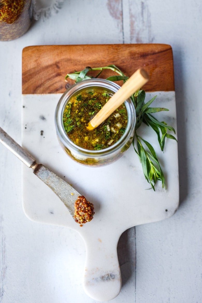 Bright and tangy, this Mustard Seed Maple Dressing with tarragon and shallots is the perfect complement to roasted or grilled veggies and hearty salads.  Easy, quick, and Vegan!
