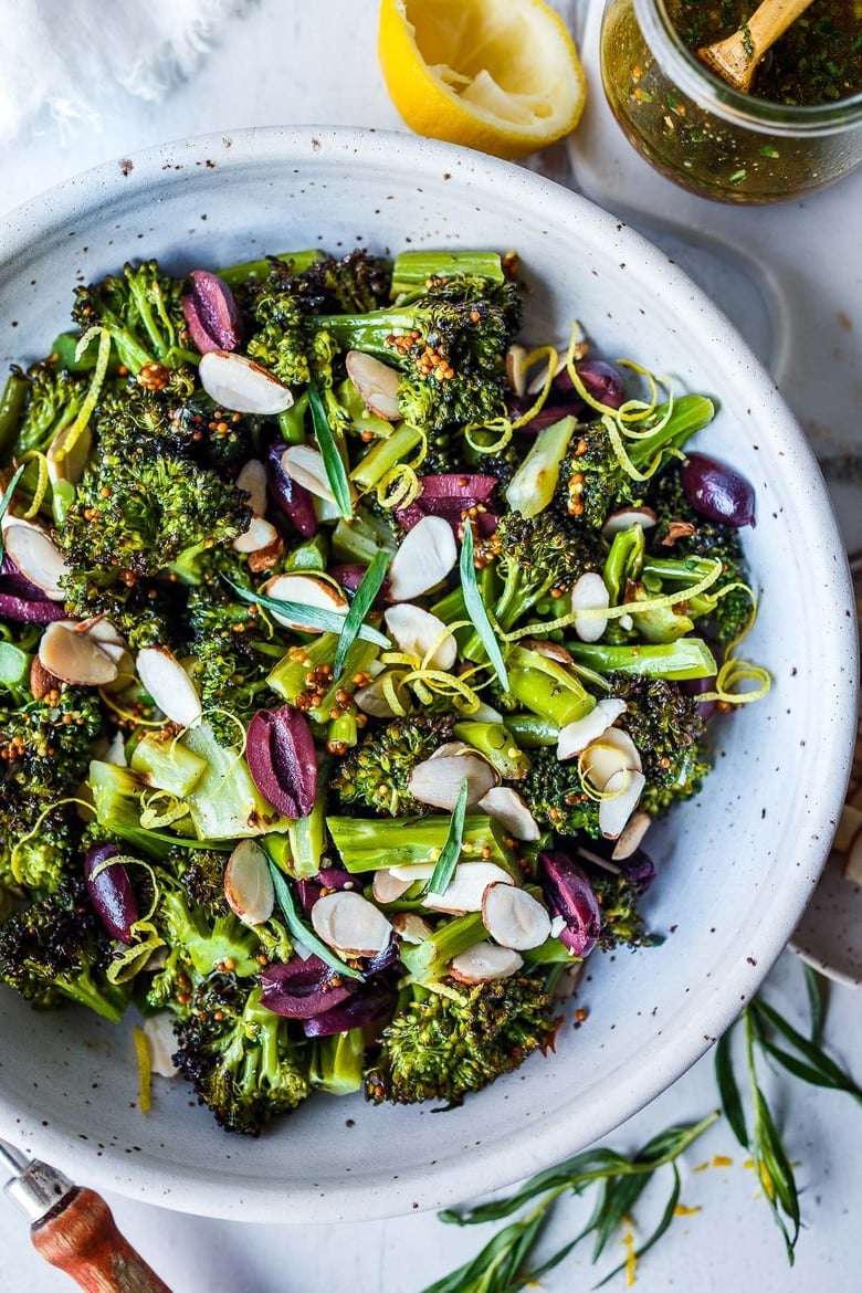 Easy Roasted Broccoli Salad with toasted almonds, kalamata olives, and lemon zest, drizzled with delicious Mustard Seed Maple Dressing.  Amazingly simple, yet filled with so much vibrant flavor. 