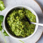 Fresh and lively, Cilantro Pesto is full of zippy flavor and totally adaptable! Toss with pasta, spread on bread, or serve with soups, grilled salmon, beans and eggs. Healthy and easy to make!