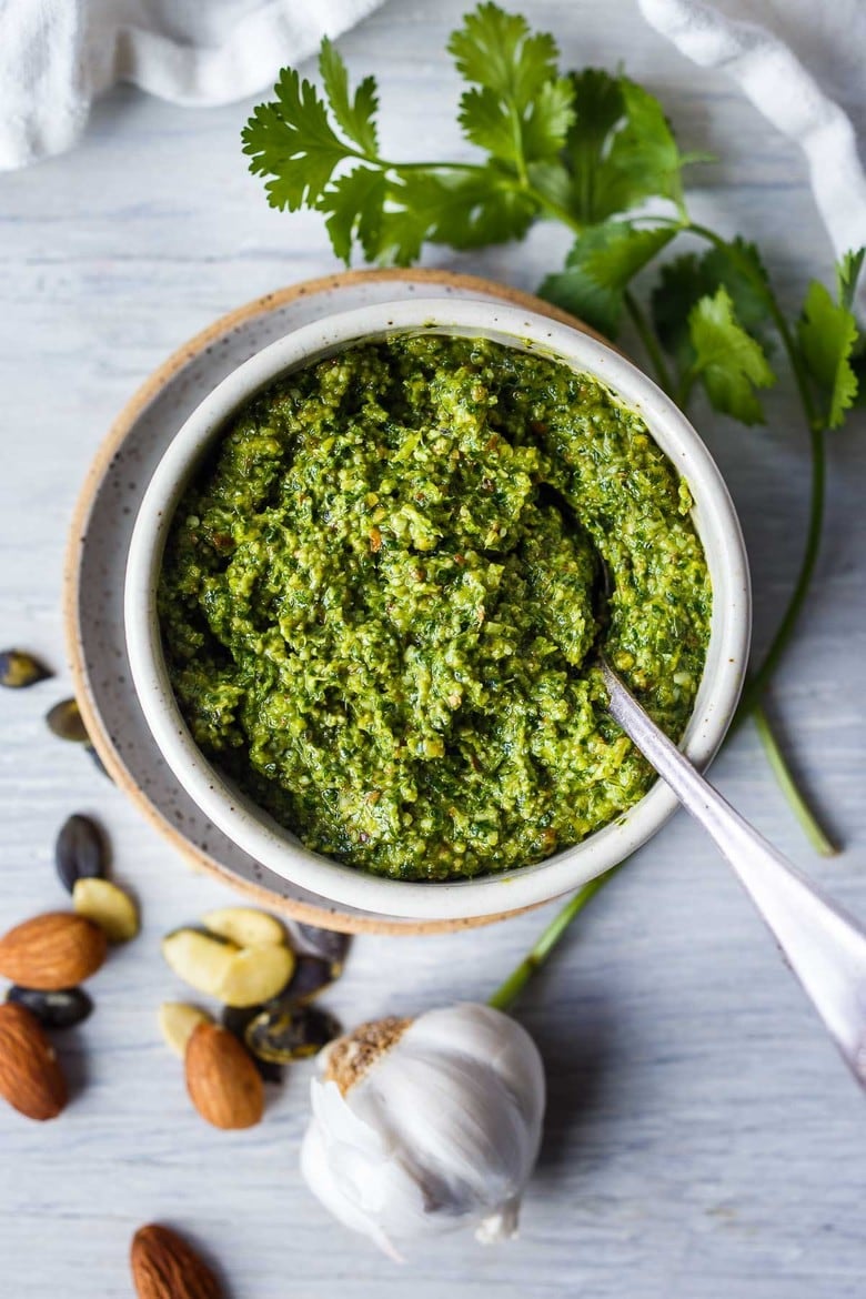 Fresh and lively, Cilantro Pesto is full of zippy flavor and totally adaptable!   Toss with pasta, spread on bread, or serve with soups, grilled salmon, beans and eggs.  Vegan-adaptable, healthy and easy to make!